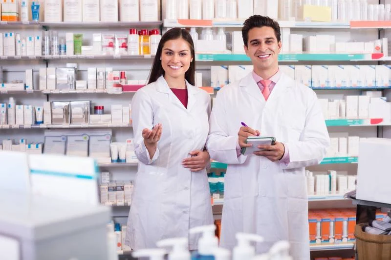 Pharmacists at a pharmacy counter